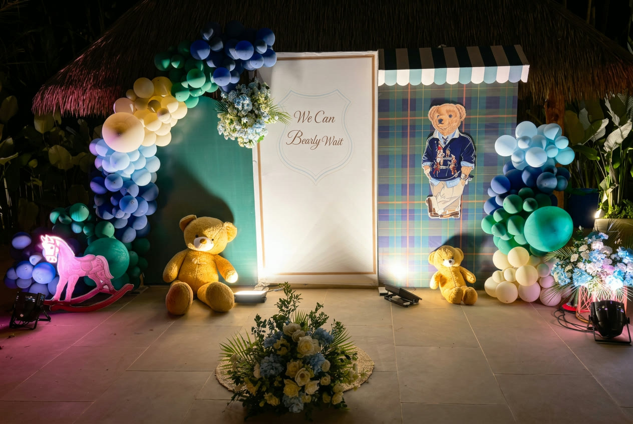 Teddy bear baby shower backdrop with pastel balloons